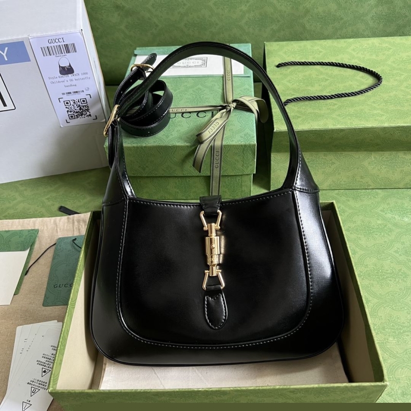 G*u*i top handle bags